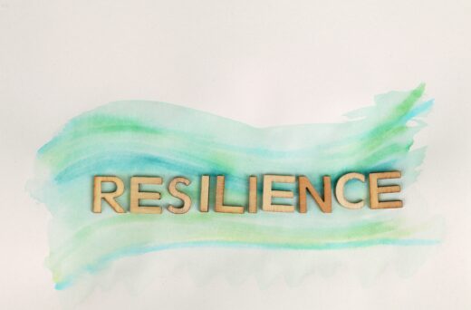 An inspiring photo featuring the word 'Resilience' boldly displayed, symbolizing the spirit of perseverance and the strength to overcome obstacles.